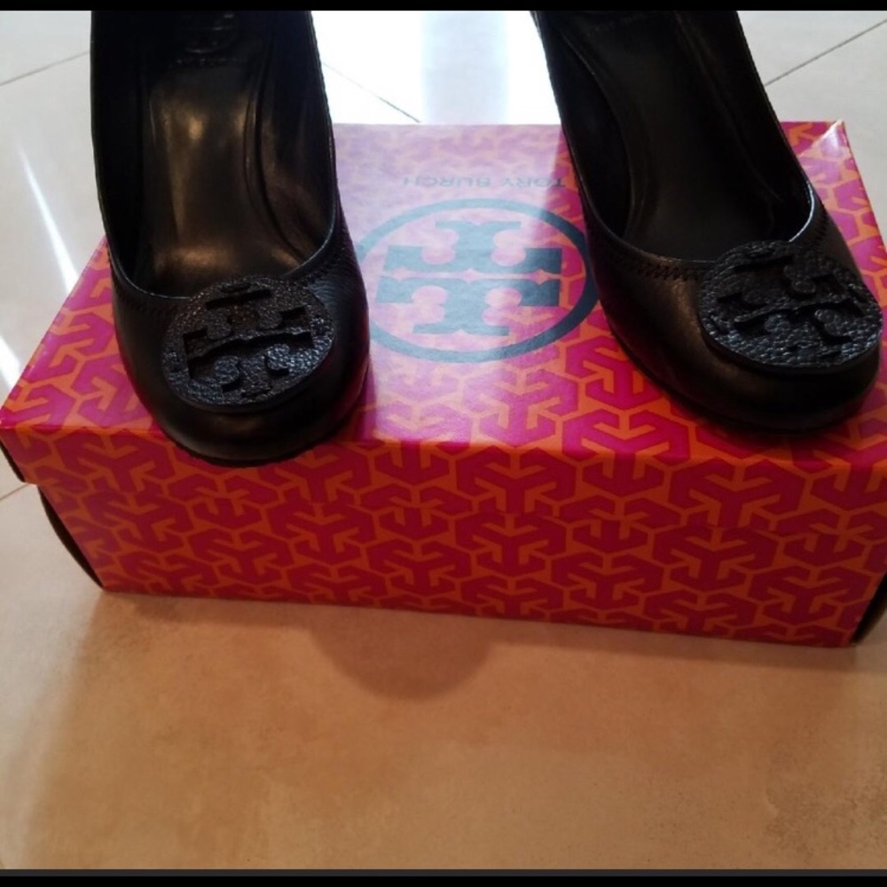 Tory Burch closed toe wedges.